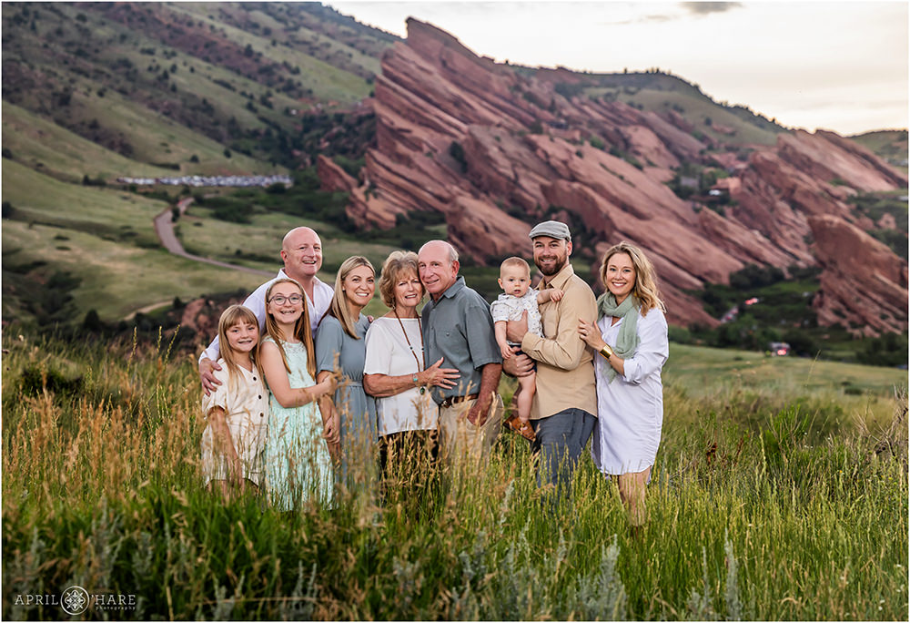 Cute Family Portrait with Red Rocks Amphitheater in the Backdrop in Morrison Colorado