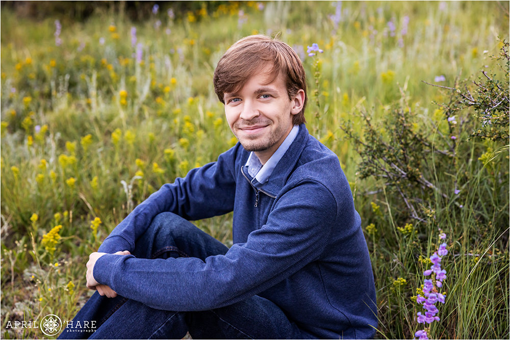 Senior photo in the wildflowers of Colorado