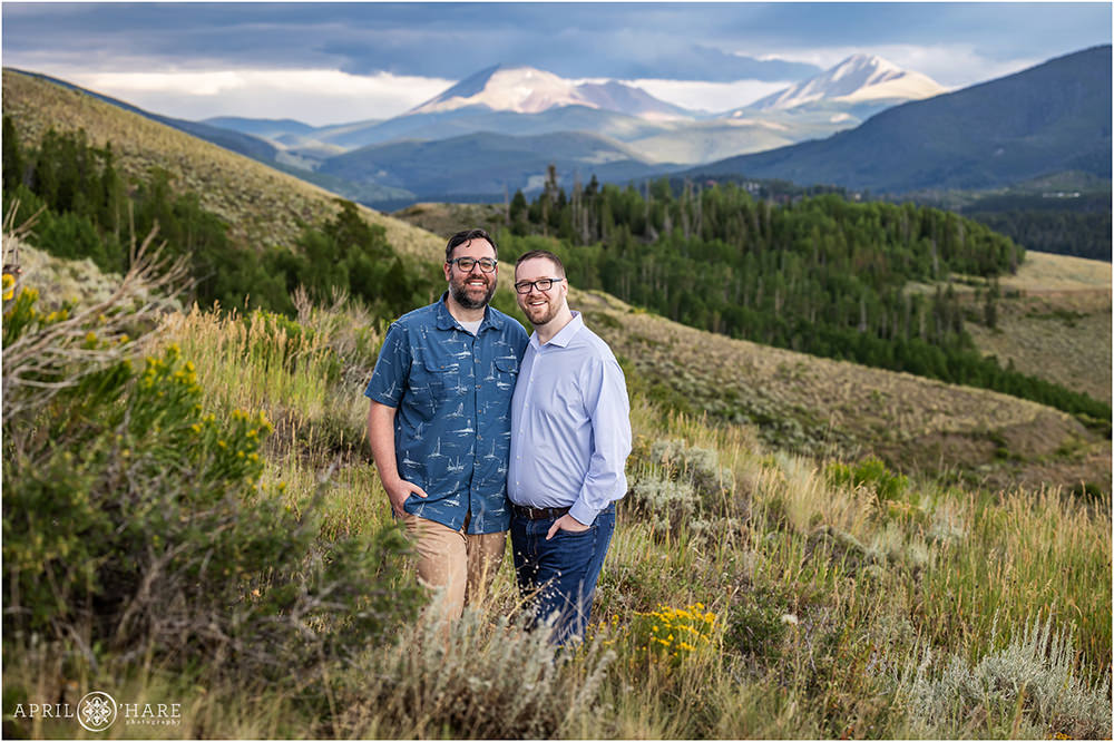 Couples portrait at Tenderfoot Mountain Trailhead with views of the mountains in Keystone Colorado