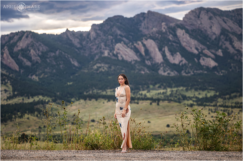 Stunning high school senior portrait with pretty Colorado Mountain Backdrop on Highway 93 south of Boulder