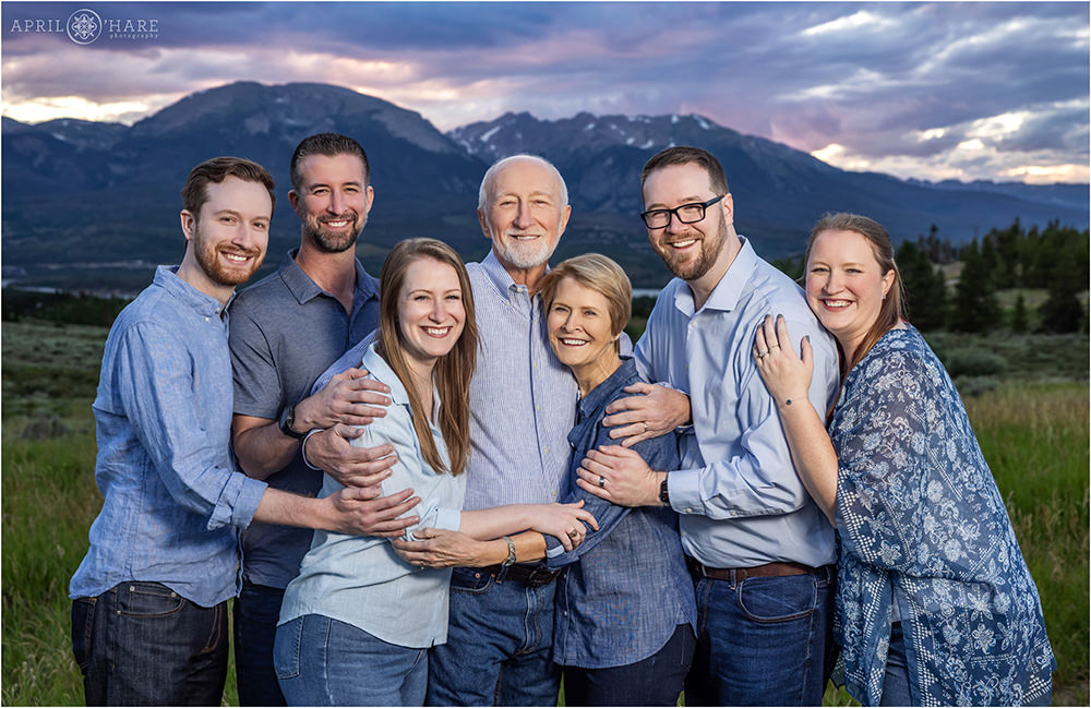 Cute family portrait at Sunset with a mountain backdrop in Summit County Colorado