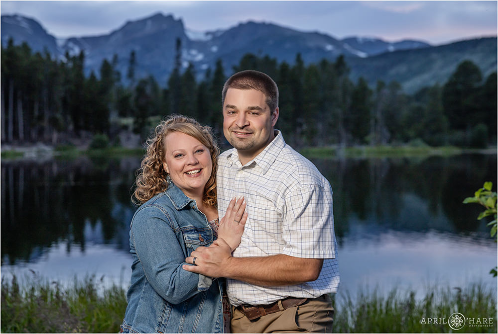 Couples photo at dusk with Sprague Lake mountain backdrop at RMNP in Colorado