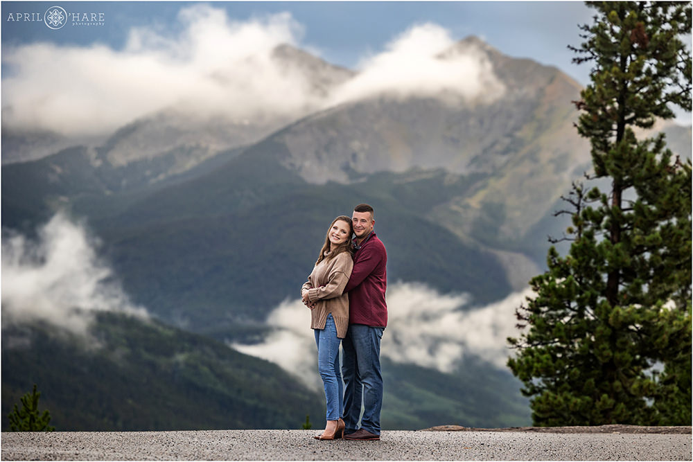 Gorgeous misty mountain backdrop for engagement photos at Sapphire Point in Colorado