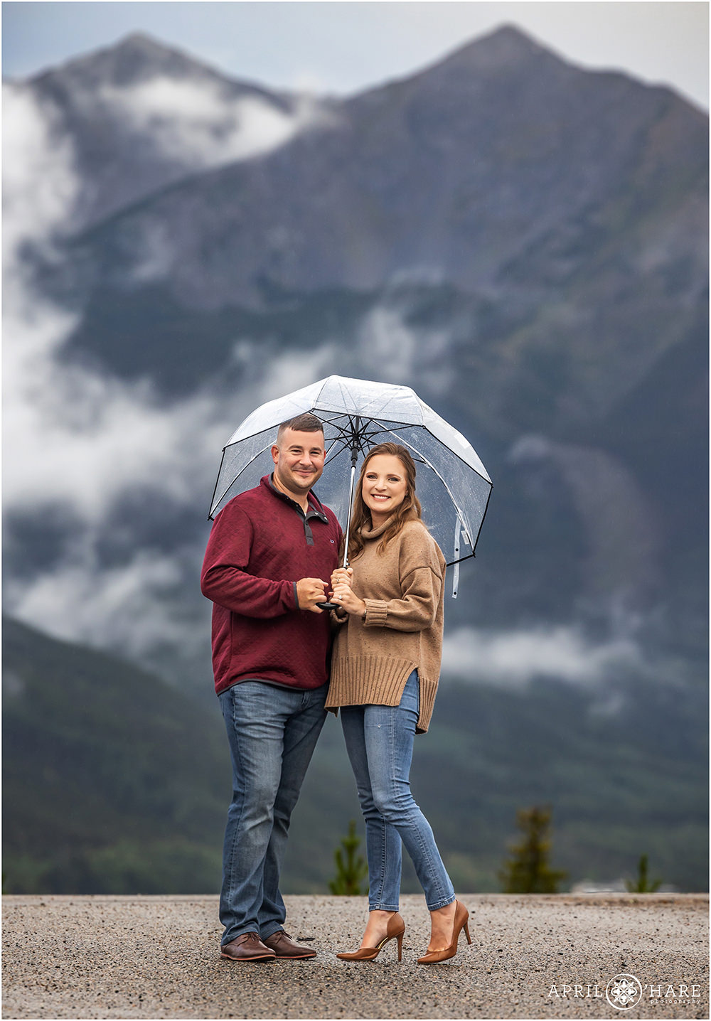Rainy summer engagement session at Sapphire Point with a pretty large blue mountain backdrop