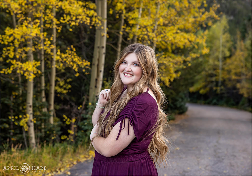 Beautiful senior portrait with fall color backdrop on Guanella Pass near Georgetown Colorado