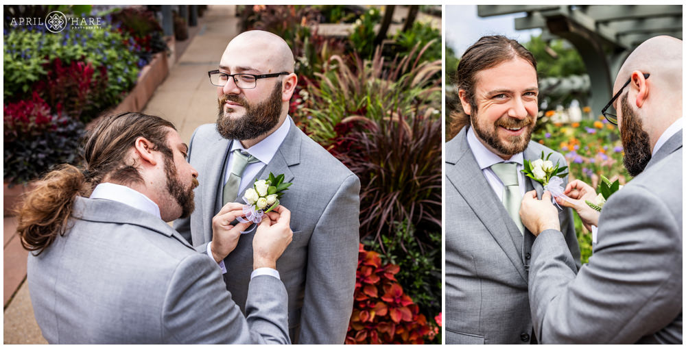 Groom and his brother put on their boutonniere's at Denver Botanic Gardens
