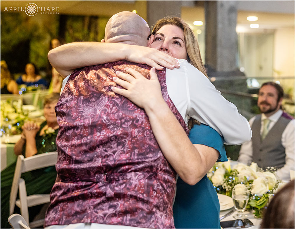 Mother of the groom hugs him at Marnie's Pavilion