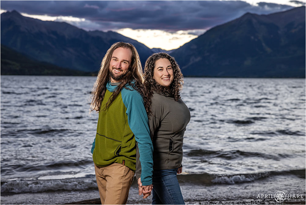 Beautiful lake and mountain backdrop for a couple at their September engagement photography session in Twin Lakes, Colorado