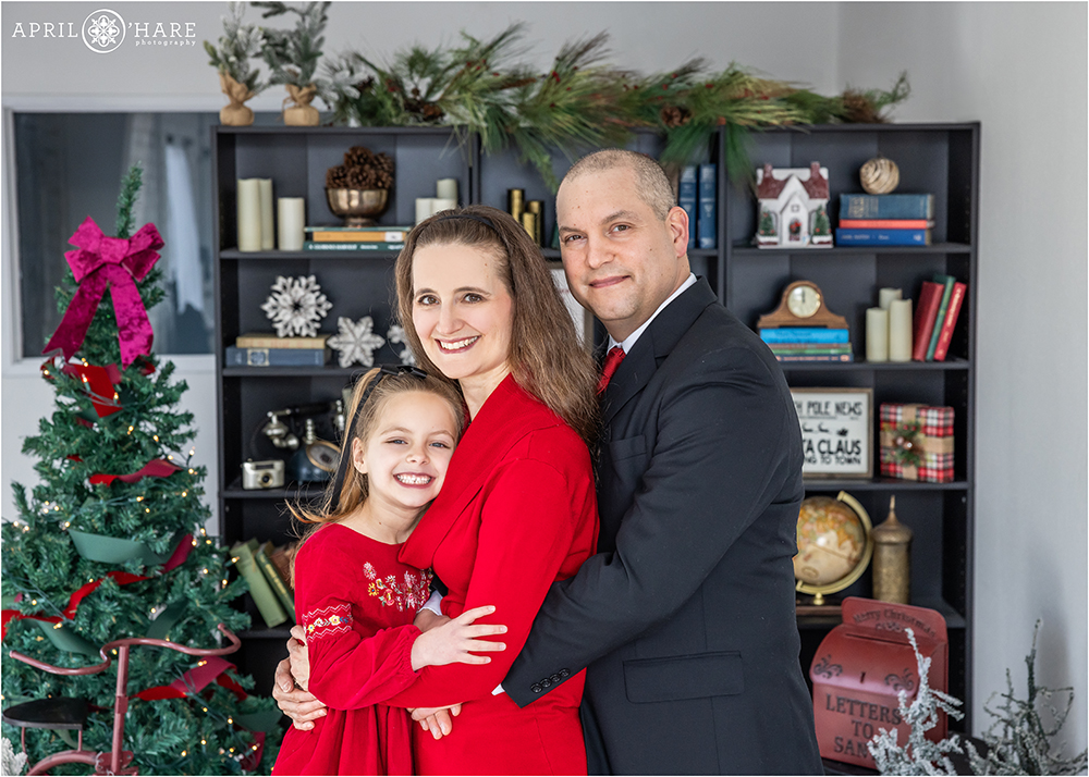 Beautiful indoor family photos with a Christmas set in Denver CO
