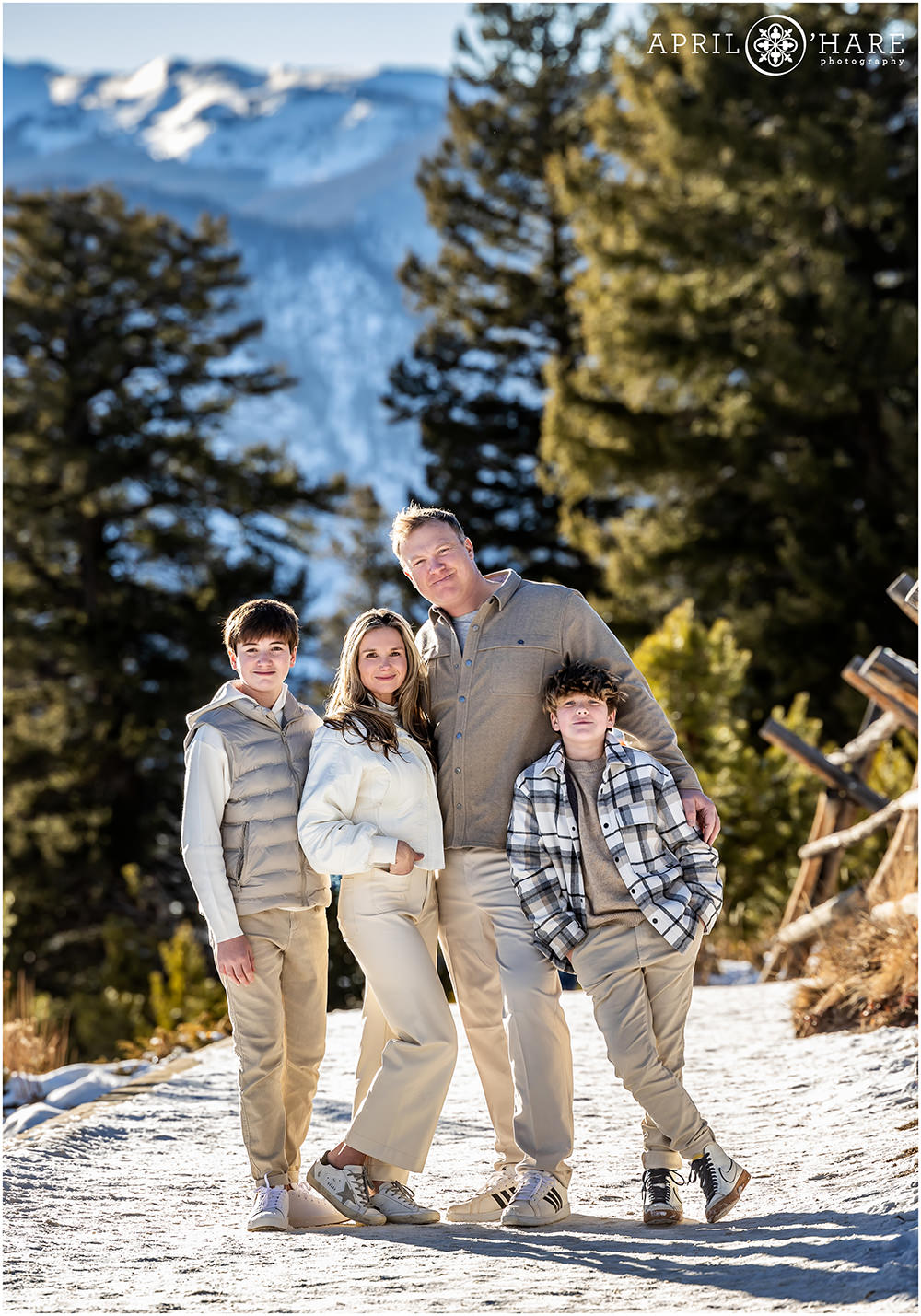 Bright sunny Colorado family portrait during winter at Sapphire Point