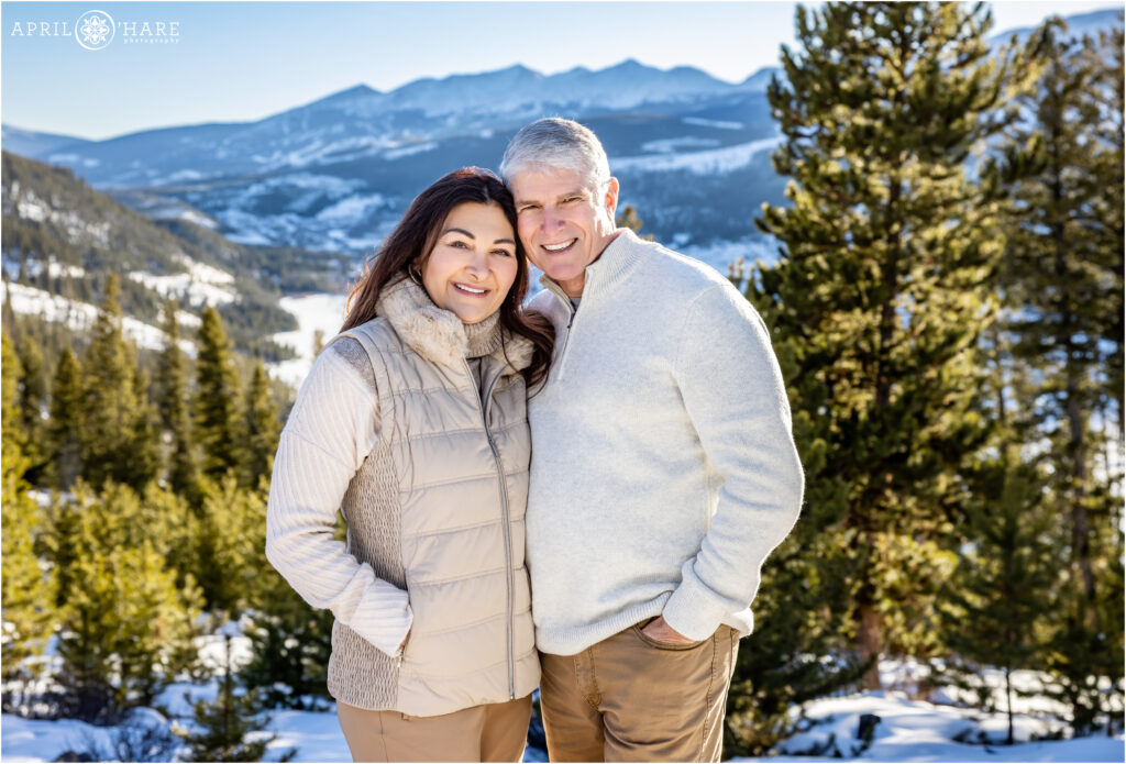 Couples portrait with a winter wonderland backdrop at Sapphire Point in Colorado