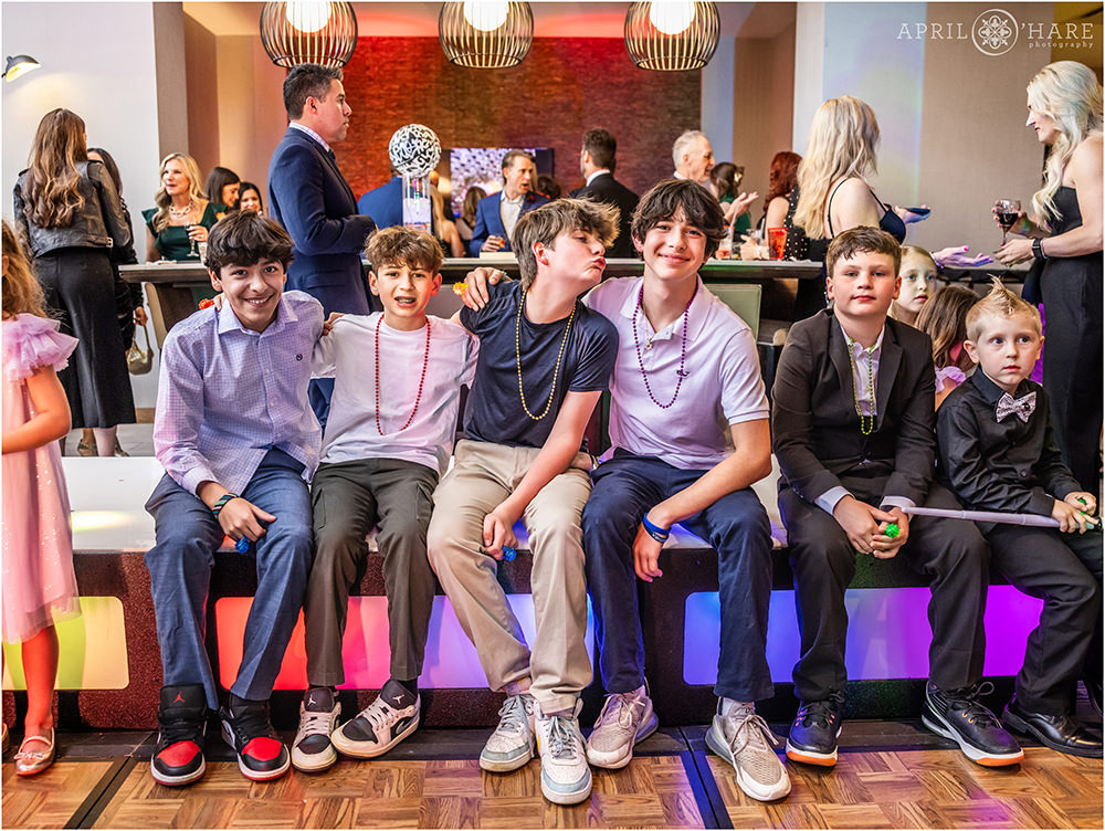 Kids hanging out at a bar mitzvah party in Denver
