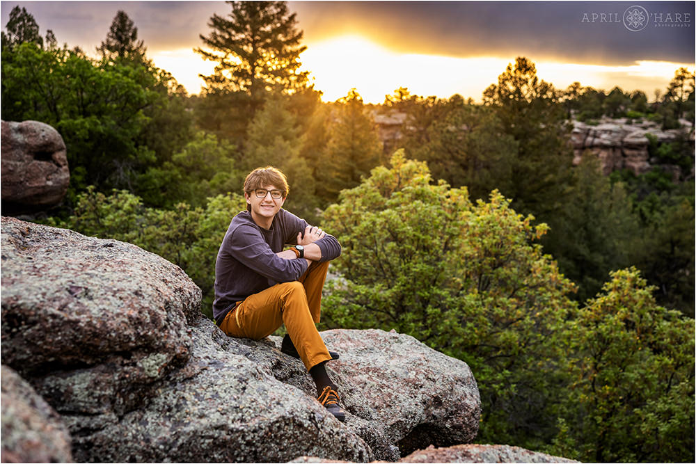 Pretty Sunset Backdrop for a Senior Photo at a Castlewood Canyon State Park in CO