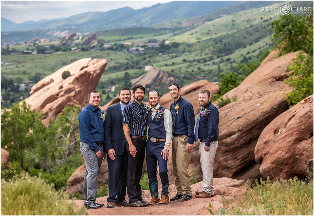 Groom with his groomsmen on the Trading Post Trail at Red Rocks in Morrison, CO