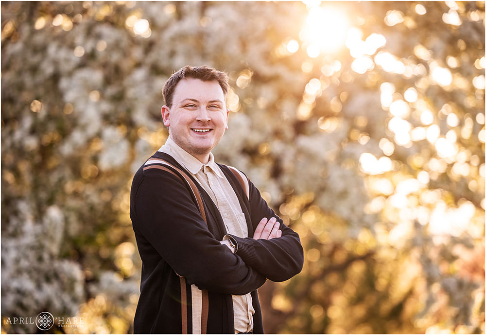 Spring time headshot portraits at City Park with tree blossom backdrop with the sun peeking through