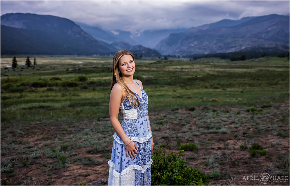Senior Girl photo at Moraine Park in Estes Park RMNP on a chilly stormy early June day