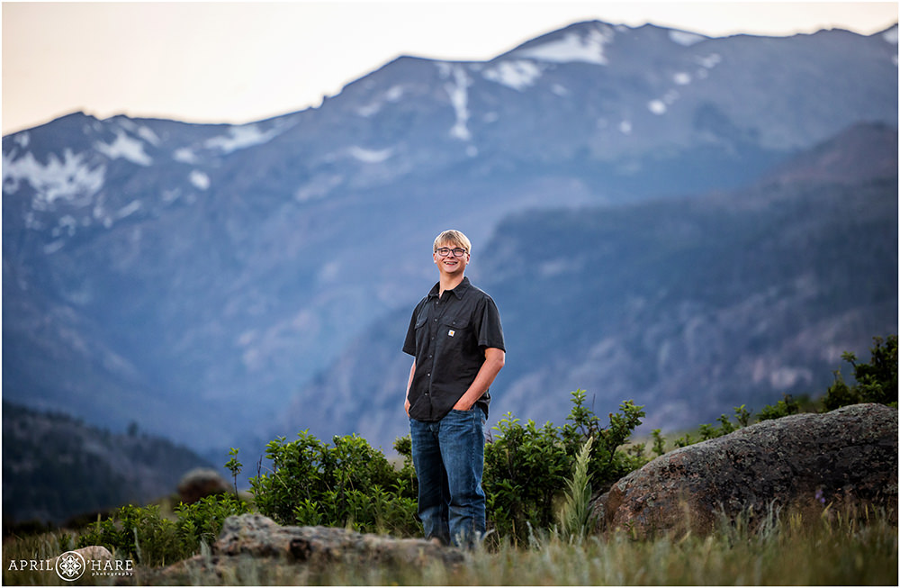 Stunning mountain backdrop for a high school senior photoshoot at Moraine Park in Estes Park