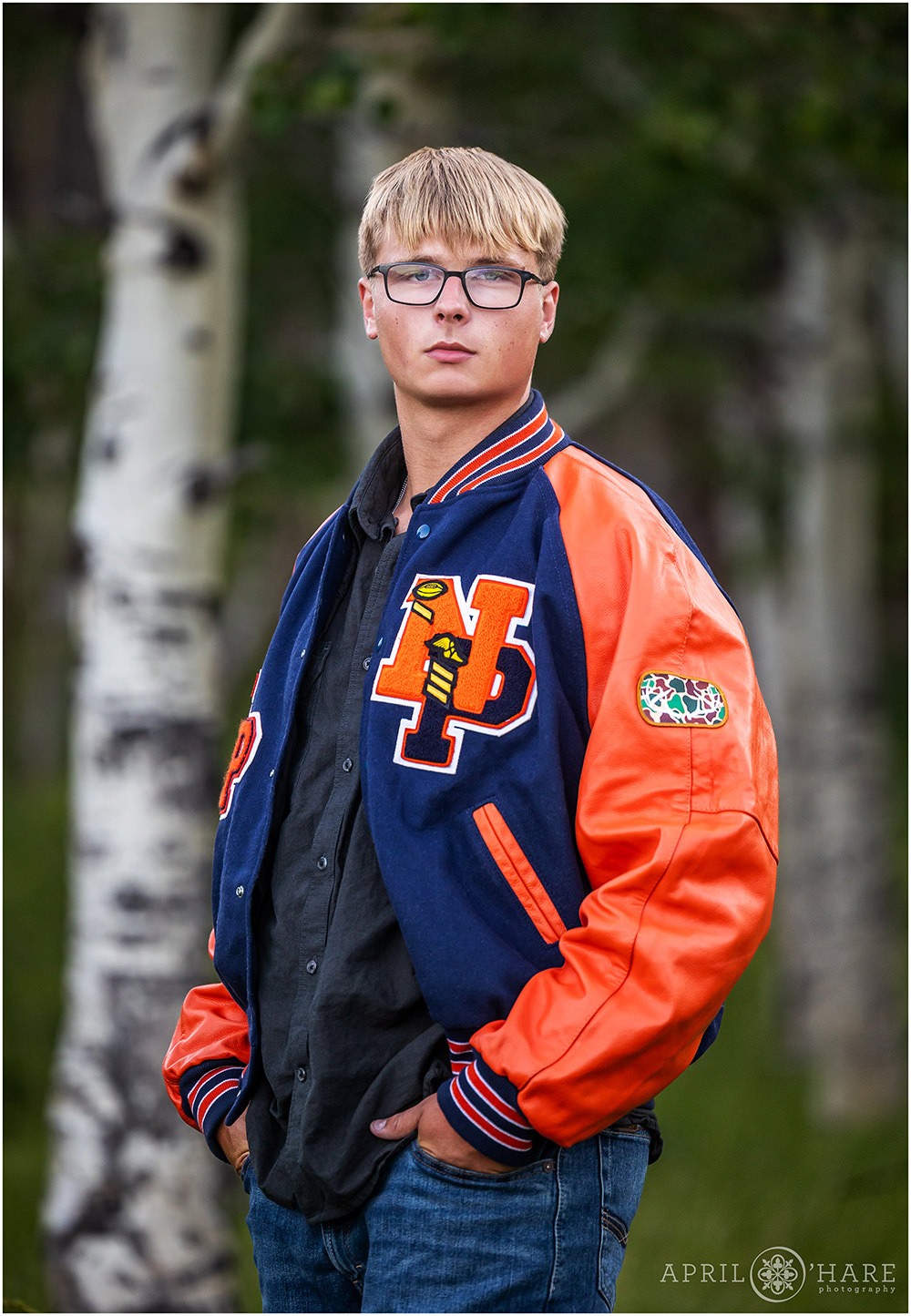 Aspen tree backdrop for a senior photoshoot at Rocky Mountain National Park