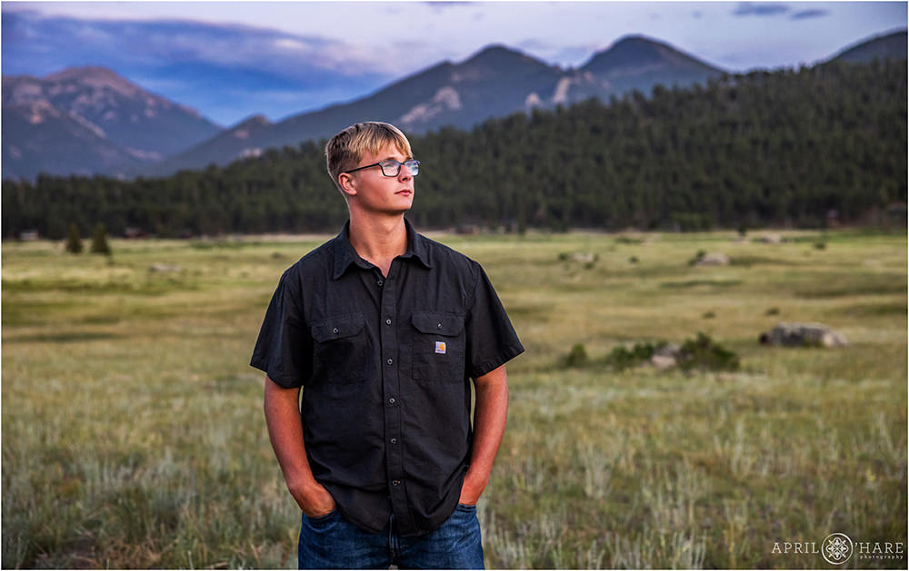 Senior photo at sunset at Moraine Park inside of Rocky Mountain National Park in Estes Park Colorado