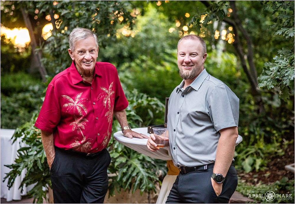 Wedding guests hanging out at sunset at the Woodland Mosaic Solarium at Denver Botanic Gardens