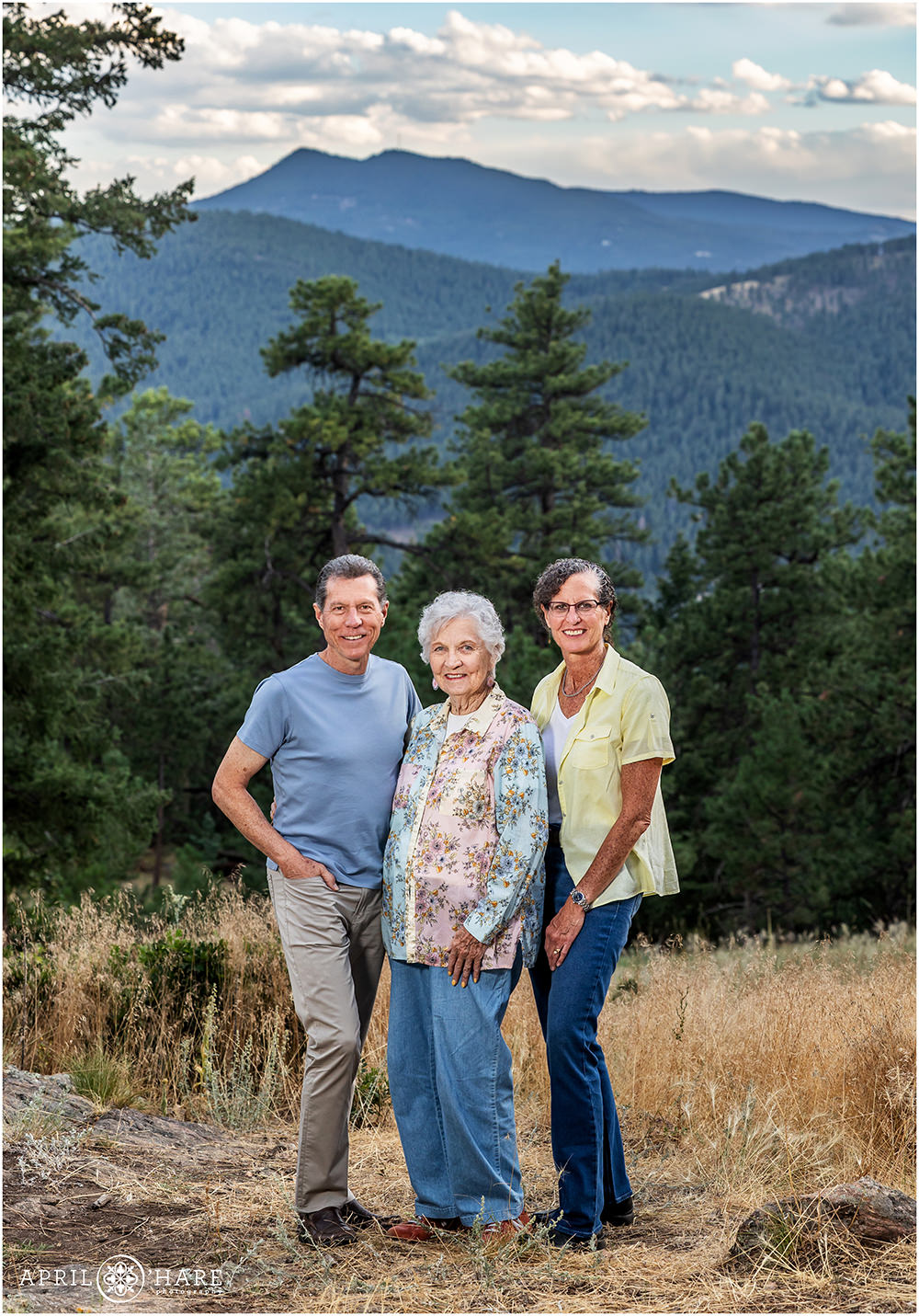 Two Adult Children get a photo with their mom at West Mount Falcon in Colorado