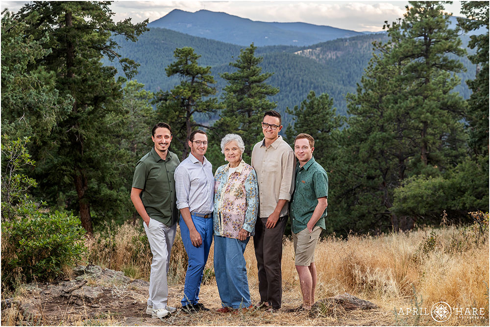 Photo of a grandmother with her grandsons in the woods at West Mount Falcon