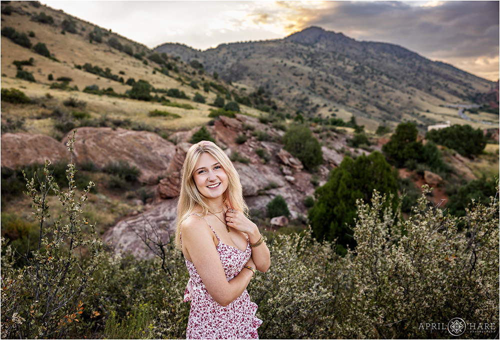 Senior photo at sunset at Morrison Trailhead in Colorado