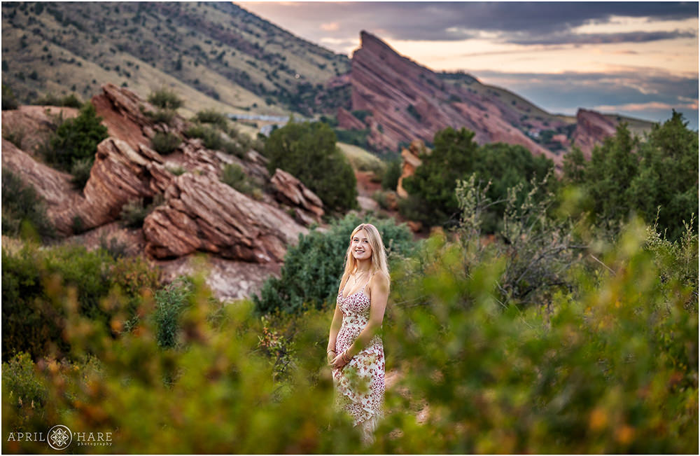 Stunning red rocks backdrop for a high school senior yearbook session at the Morrison Trailhead
