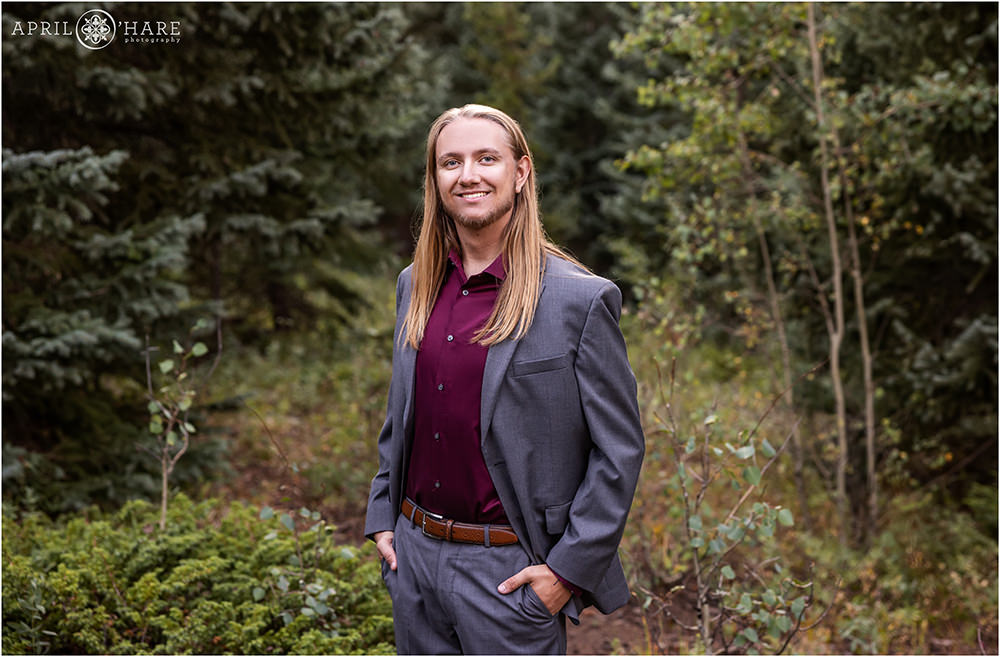 Forest senior photo in the woods of Colorado