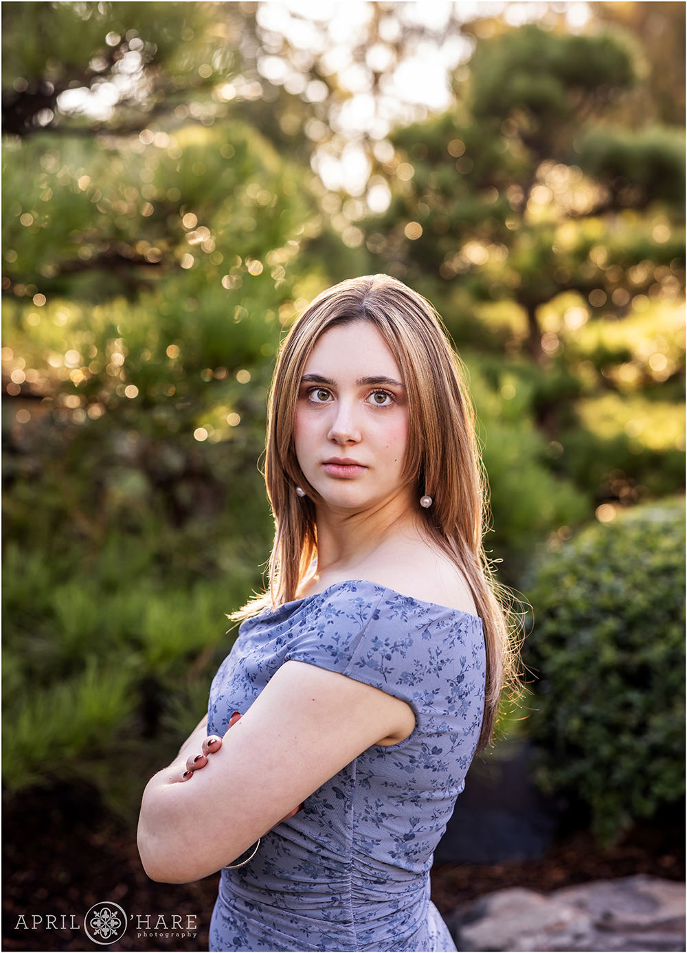 Serious look from a senior girl in the Japanese Garden area of Denver Botanic Gardens