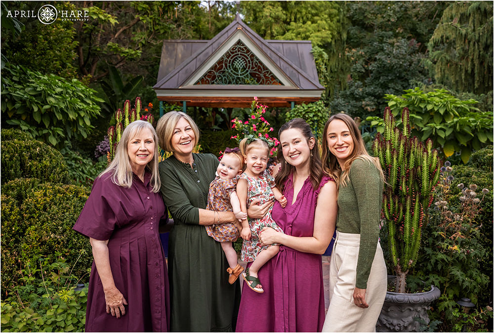 Multi generational photo of all the ladies in a family at Denver Botanic Gardens