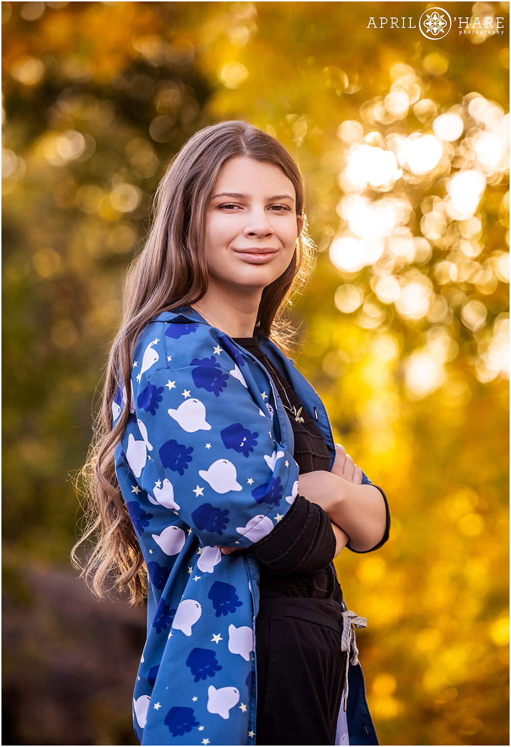 Beautiful Golden Fall Leaves Backdrop for a Senior Photo at Clear Creek History Park in Golden Colorado