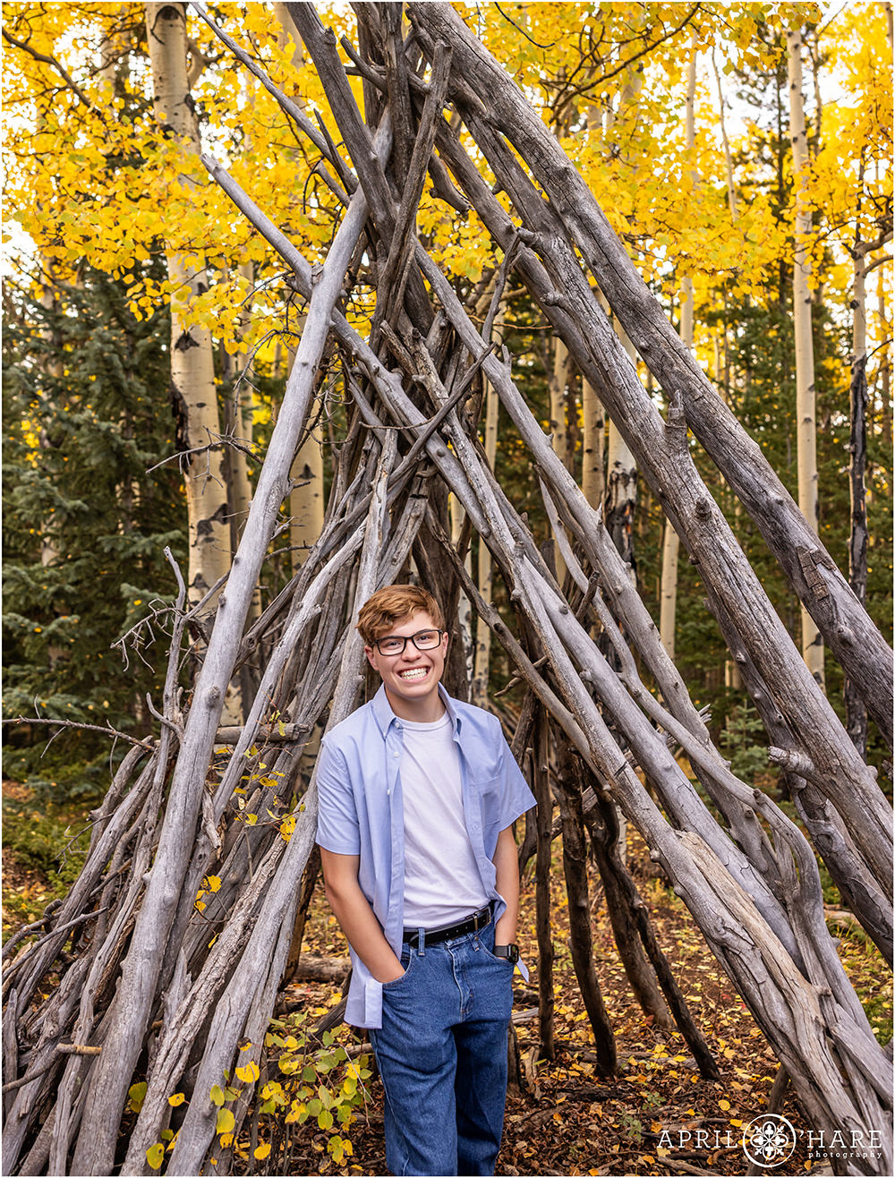 Senior portrait in the fall color at Beaver Brook Watershed Trailhead in CO