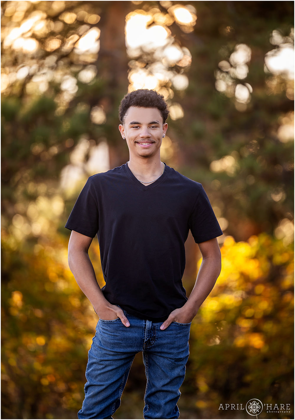 Beautiful forest fall color backdrop for a senior portrait at West Mount Falcon
