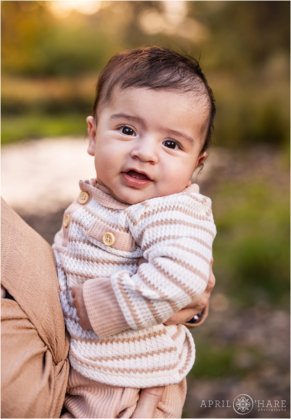 Cute photo of a four month old baby boy at Clear Creek in Wheat Ridge Colorado