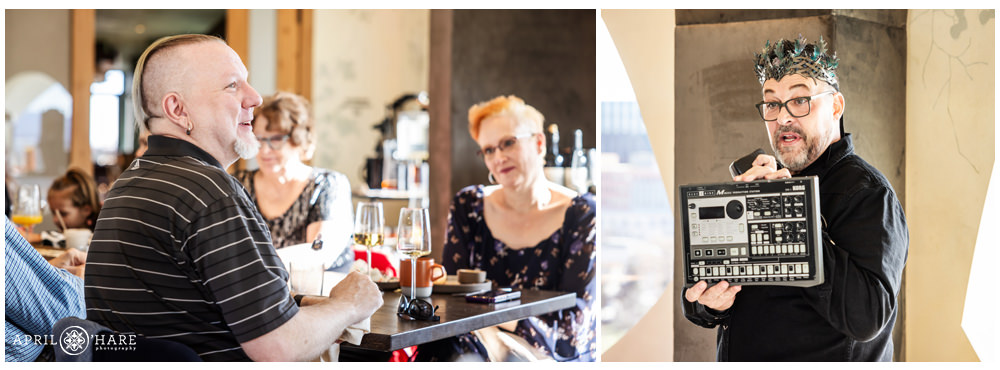 Man holds up his gift at his birthday brunch at Stellar Jay at Populous Hotel in Denver, CO