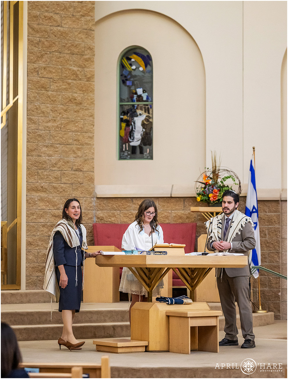 A young lady speaks during her bat mitzvah service at the Hebrew Educational Alliance