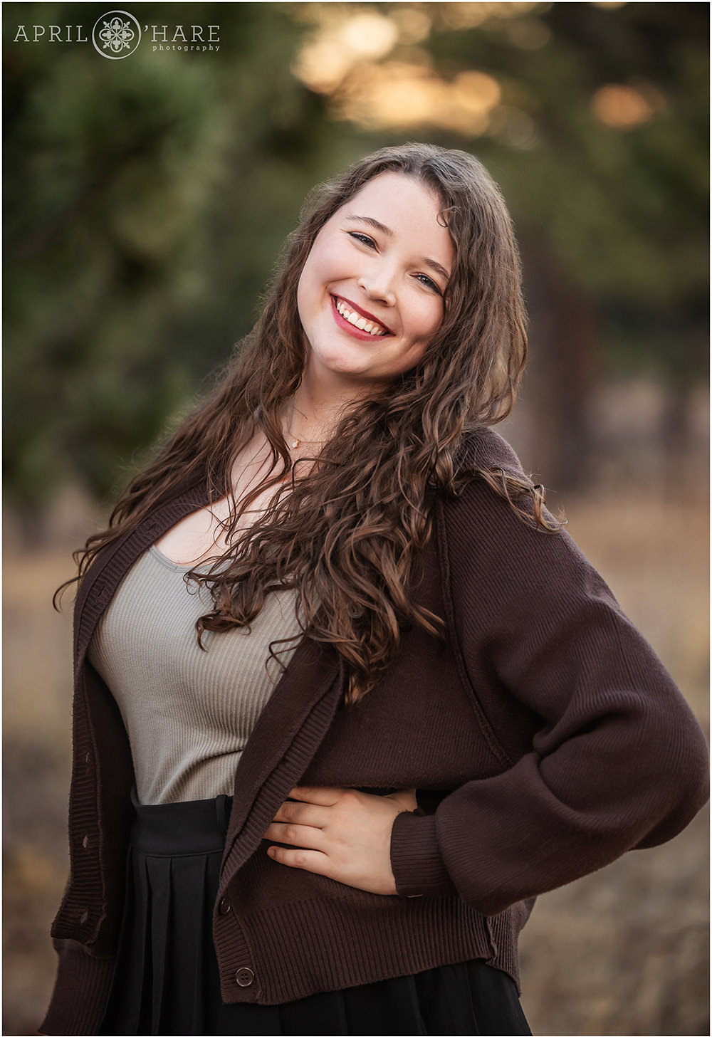 Pretty portrait of a young lady in the forest at her family photoshoot in South Boulder Colorado