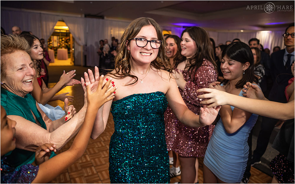 Bat mitzvah girl makes a grand entrance to her party at Hebrew Educational Alliance