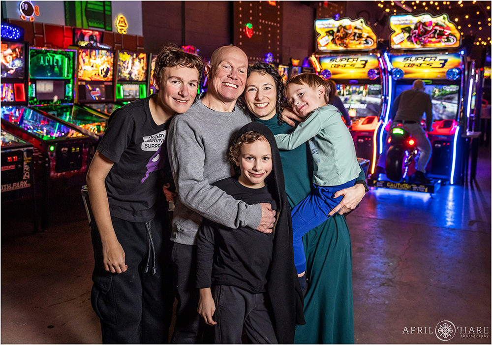 A cute candid family photo at Super Awesome Fun Factory in Denver CO