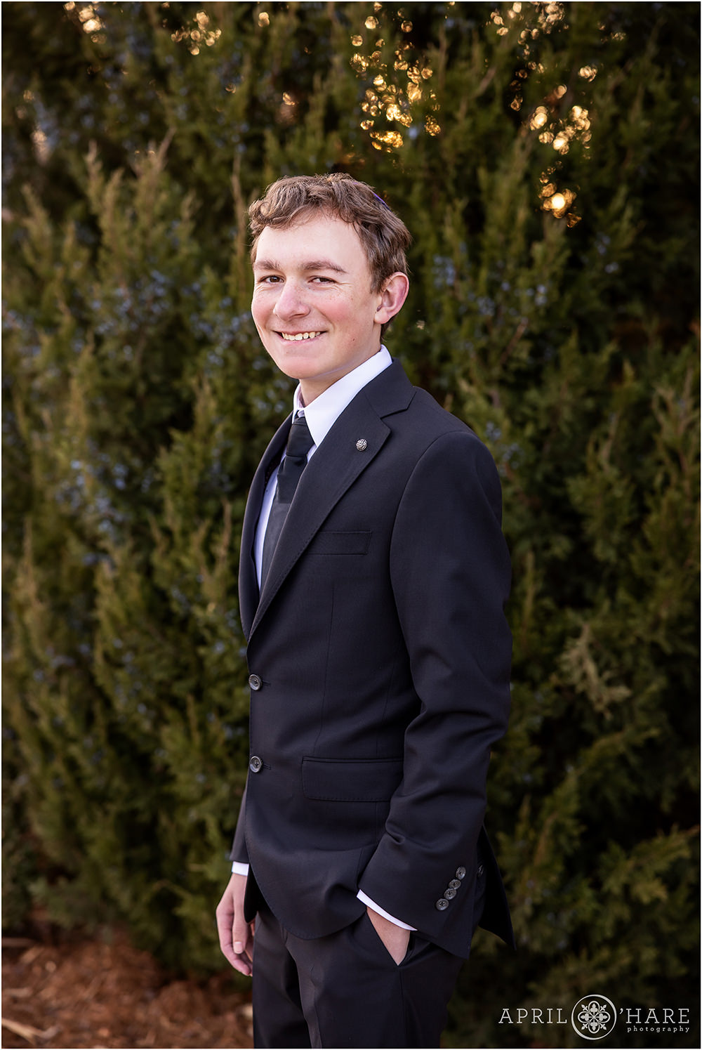 A nice outdoor portrait on a winter day at a young man's bar mitzvah rehearsal at Temple Sinai in Denver CO