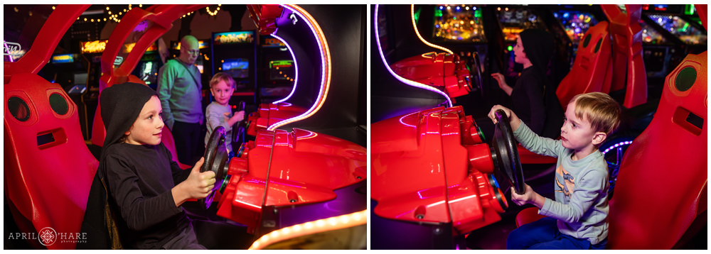 Kids play a race car driving video game at their big brother's bar mitzvah party at Super Awesome Fun Factory in Denver, CO