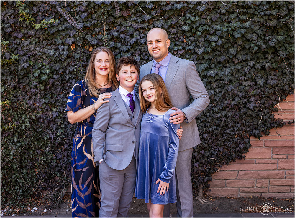A family of four at Temple Emanuel on the day of their oldest son's bar mitzvah in Denver CO