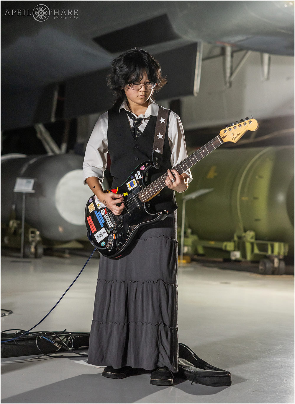 A young lady plays with her band at Wings Over the Rockies at a Bar Mitzvah party in Denver, CO