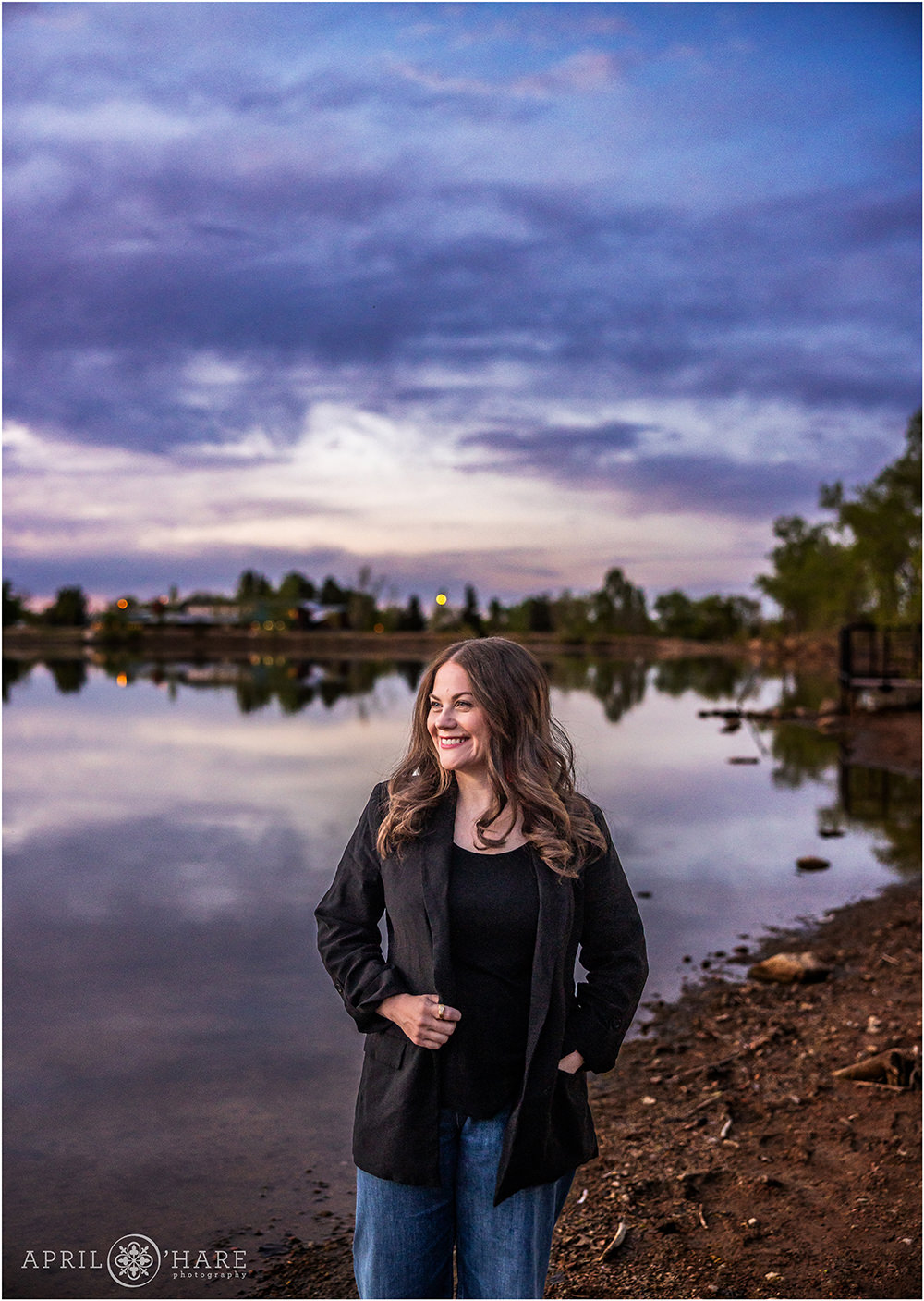 Business branding portrait at Viele Lake in Boulder Colorado with a pretty sunset sky in the backdrop
