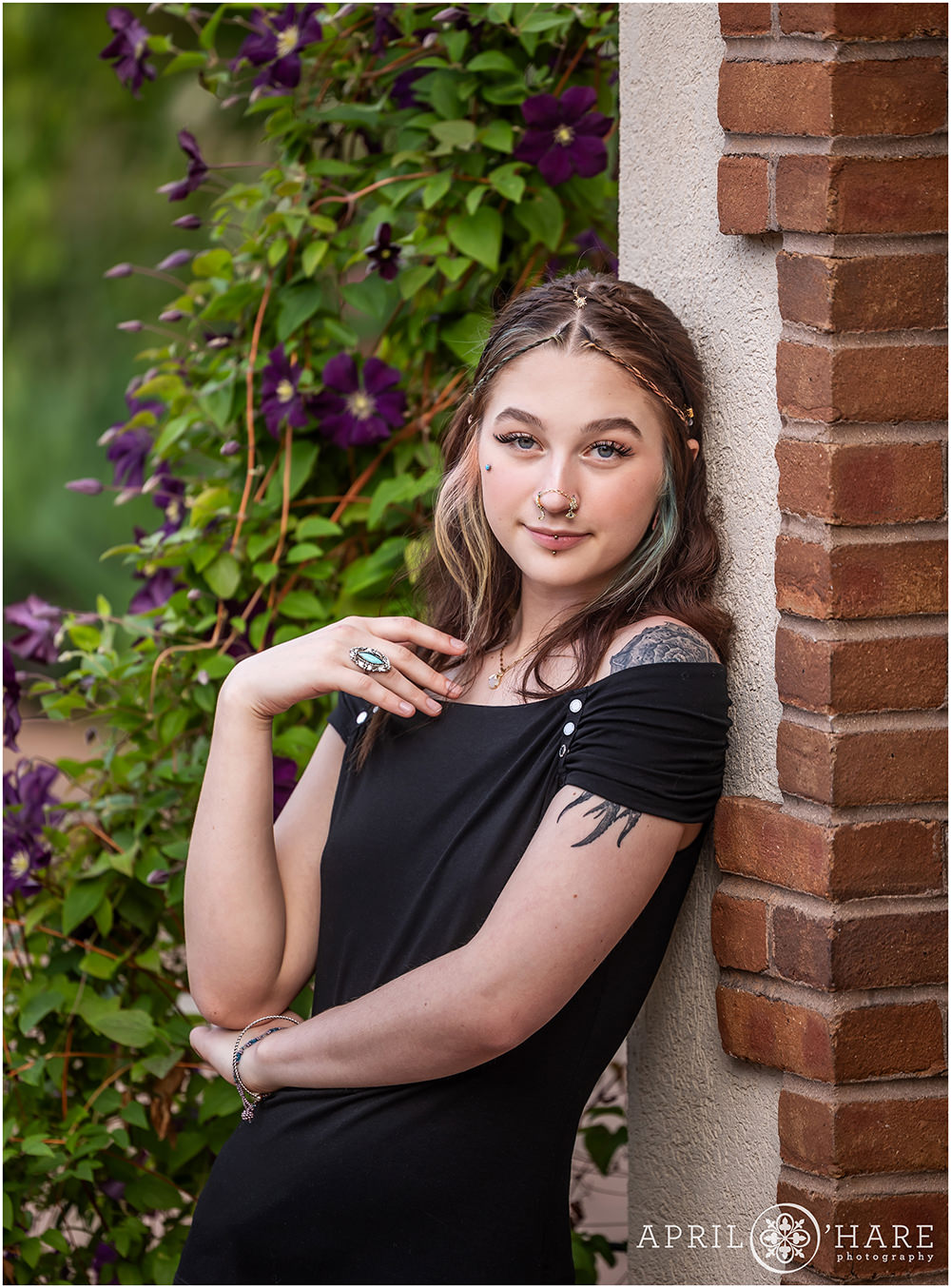 Pretty purple flower backdrop for a senior portrait at Denver Botanic Gardens