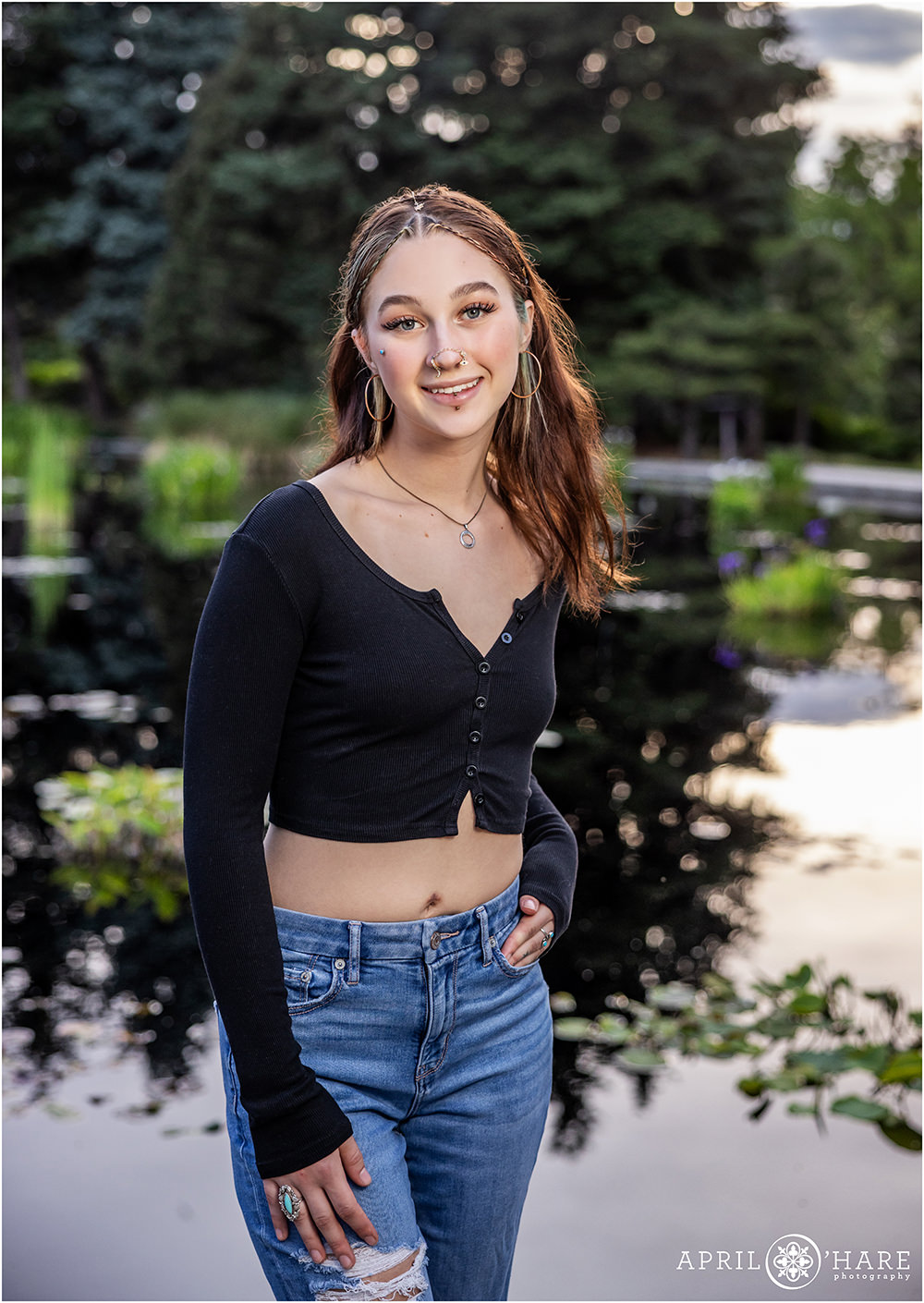 Monet Pool waterlily garden backdrop for a senior photo at Denver Botanic Gardens