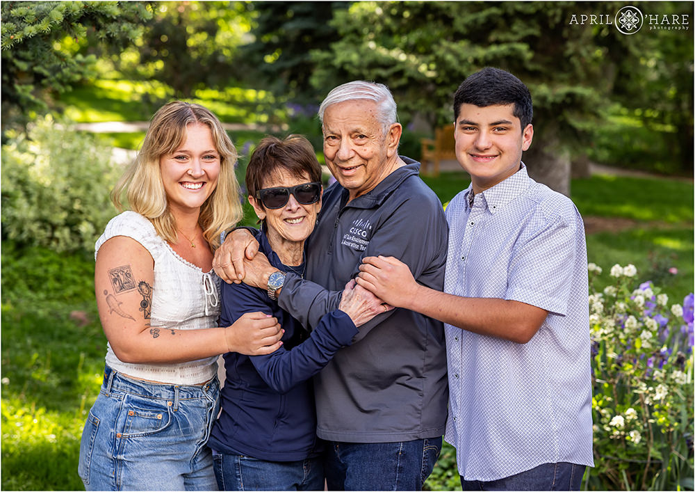 Grandparents with their grandkids in the garden at Chautauqua Park in Boulder Colorado